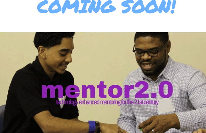 Two men using a tablet together, smiling.