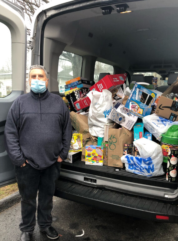 Nutmeg Big Brothers Big Sisters mentor on WTNH News with his annual "Cram the Van" toy drive