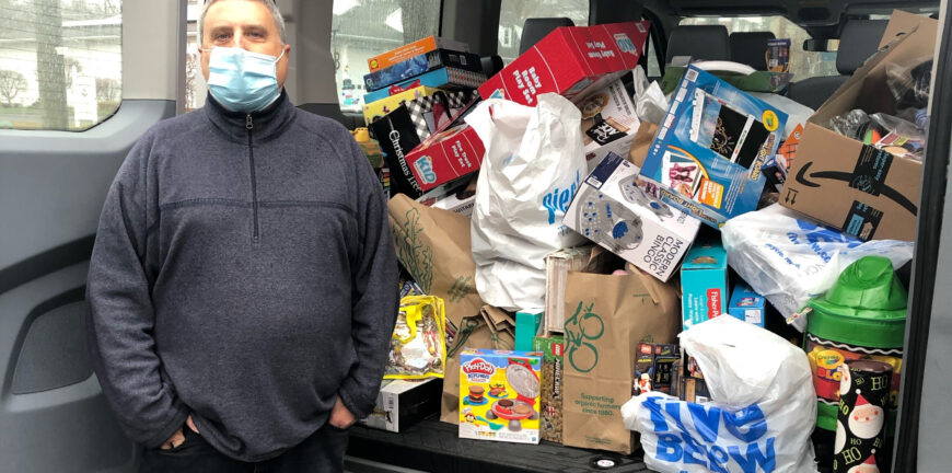 Nutmeg Big Brothers Big Sisters mentor on WTNH News with his annual "Cram the Van" toy drive